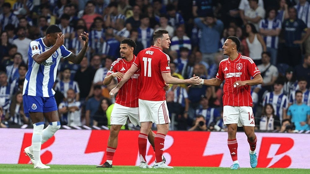 Nottingham Forest players celebrate their first goal during the Europa League quarterfinals, first leg, soccer match between FC Porto and Nottingham Forest in Porto, Portugal. - | Photo: AP/Luis Vieira