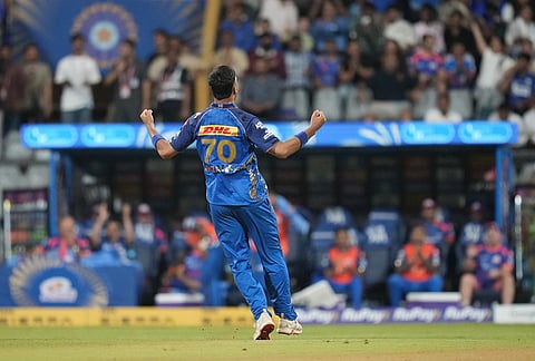 Mumbai Indians' Allah Gazanfar celebrates the wicket of Punjab Kings' Priyansh Arya during the Indian Premier League cricket match between Mumbai Indians and Punjab Kings in Mumbai.