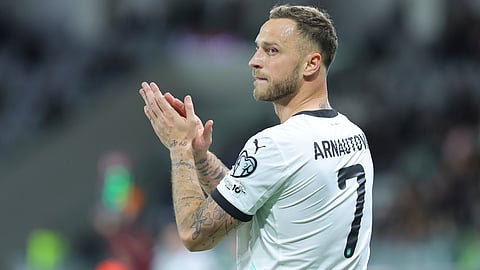 Austria's Marko Arnautovic applauds during the World Cup 2026 group H qualifying soccer match between Cyprus and Austria, in Limassol, Cyprus, Saturday, Nov. 15, 2025.