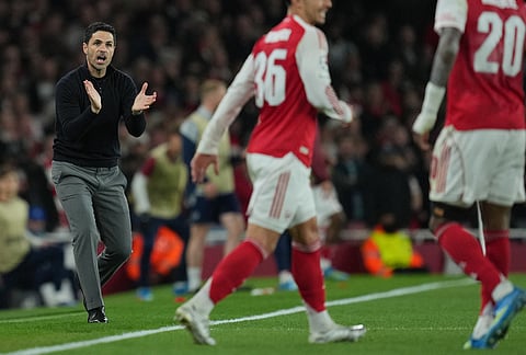 Arsenal's manager Mikel Arteta gives instructions during the UEFA Champions League second leg quarterfinal soccer match between Arsenal and Sporting in London, England.