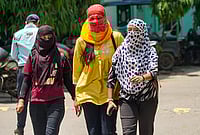 Day In Pics: April 16, 2026 | Photo: PTI : Women cover themselves amid heat on a hot summer day, in Varanasi, Uttar Pradesh.