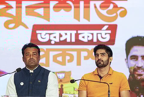 BJP leaders former tennis player Leander Paes and boxer Vijender Singh during the launch of BJP's Yuva Shakti Card, in Kolkata, West Bengal.