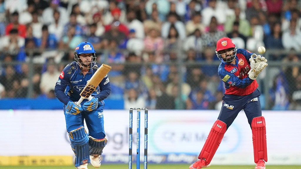 Mumbai Indians' wicketkeeper Quinton de Kock plays a shot during the Indian Premier League cricket match between Mumbai Indians and Punjab Kings in Mumbai, India, Thursday, April 16, 2026. - AP Photo/Rafiq Maqbool