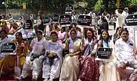 All India Mahila Congress President Alka Lamba (C) along with SC ST members during their protest demanding SC ST reservation in Women reservation bill at Jantar Mantar in New Delhi on Thursday. : Photo by Tribhuvan Tiwari 