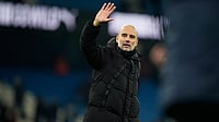English Premier League 2025-26: Title Race Will Be 'Over' If Manchester City Loses To Arsenal, Says Guardiola | Photo: AP/Dave Thompson : Manchester City's head coach Pep Guardiola waves fans after the English Premier League soccer match between Manchester City and Chelsea in Manchester, England.