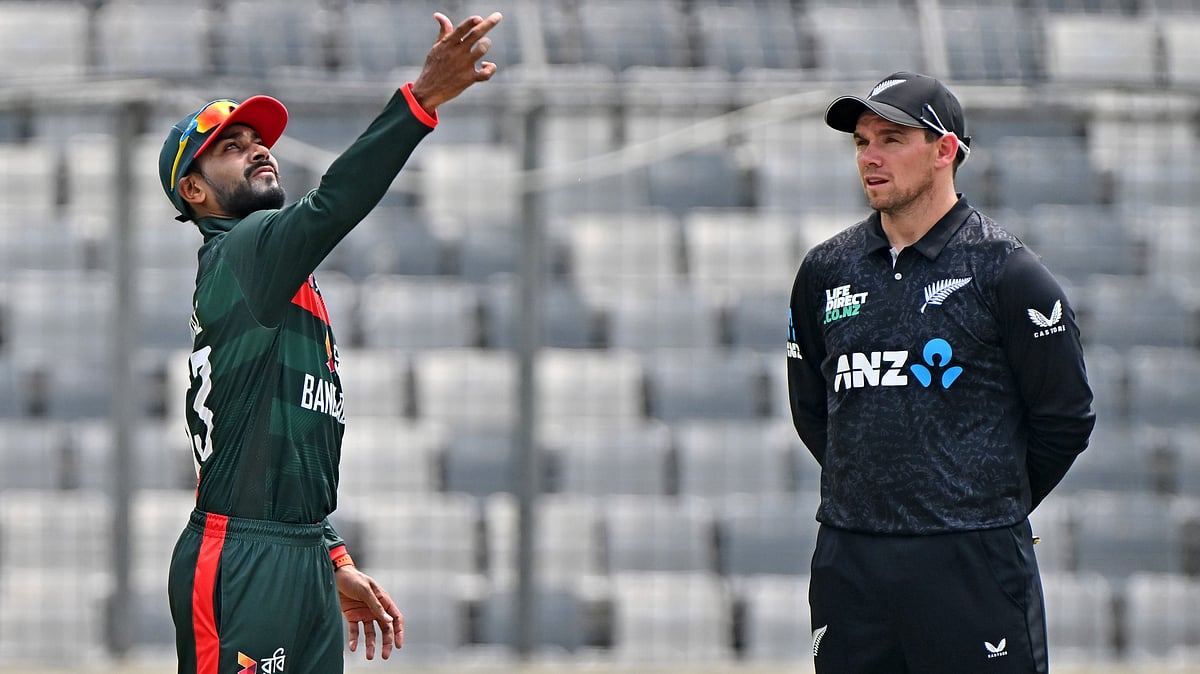 Bangladesh's captain Mehidy Hasan Miraz, left, tosses the coin as New Zealand's captain Tom Latham looks on before the start of the first one day international cricket match between Bangladesh and New Zealand in Mirpur, Bangladesh, Friday, April 17, 2026. - AP Photo