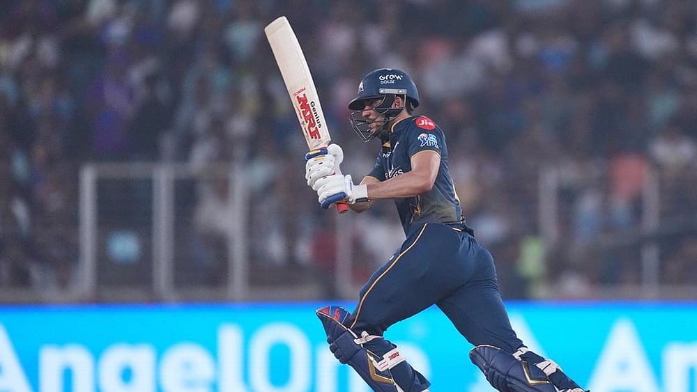 Gujarat Titans' captain Shubman Gill plays a shot during the Indian Premier League cricket match between Gujarat Titans and Kolkata Knight Riders in Ahmedabad. - | Photo: AP/Ajit Solanki