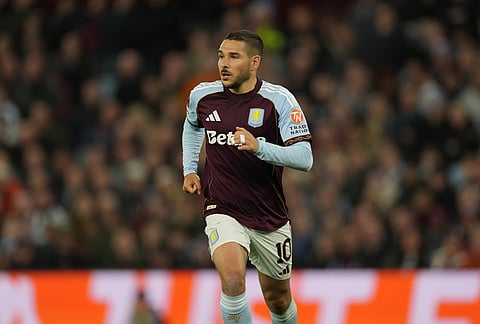 Aston Villa's Emiliano Buendia runs during the Europa League quarterfinal second leg soccer match between Aston Villa and Bologna, in Birmingham, England.