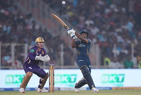 Gujarat Titans' Sai Sudharsan plays a shot during the Indian Premier League cricket match between Gujarat Titans and Kolkata Knight Riders in Ahmedabad.