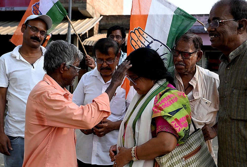 Congress candidate from the Ranaghat Dakshin Assembly constituency, Rita Pal Das, campaigns ahead of the West Bengal Assembly elections, in Nadia, West Bengal. - | Photo: PTI
