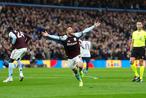 Aston Villa's Emi Buendia celebrates scoring their side's second goal during the Europa League quarterfinal second leg soccer match between Aston Villa and Bologna, in Birmingham, England.