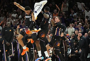 | Photo: AP/Ross D. Franklin : Phoenix Suns forward Royce O'Neale, center, celebrate a 3-pointer against the Portland Trail Blazers with Suns forward Ryan Dunn (0) and Suns' Collin Gillespie during the second half of an NBA play-in tournament basketball game, in Phoenix.