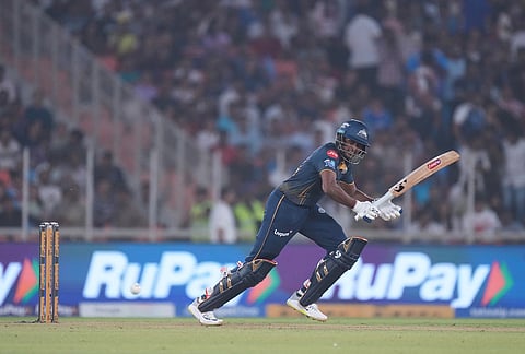 Gujarat Titans' Sai Sudharsan plays a shot during the Indian Premier League cricket match between Gujarat Titans and Kolkata Knight Riders in Ahmedabad.