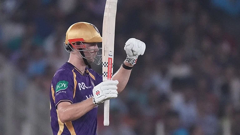 Kolkata Knight Riders' Cameron Green celebrates his fifty runs during the Indian Premier League cricket match between Gujarat Titans and Kolkata Knight Riders in Ahmedabad. - | Photo: AP/Ajit Solanki