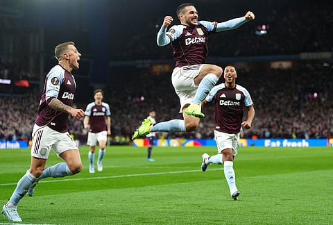 Aston Villa's Emi Buendia celebrates scoring their side's second goal during the Europa League quarterfinal second leg soccer match between Aston Villa and Bologna, in Birmingham, England.