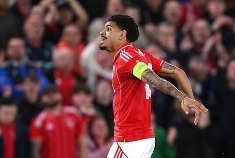 Nottingham Forest's Morgan Gibbs-White celebrates scoring during the Europa League quarterfinal second leg soccer match between Nottingham Forest and Porto in Nottingham, England.