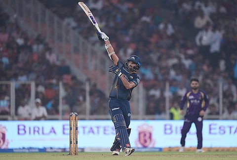 Gujarat Titans' Washington Sundar hits a boundary during the Indian Premier League cricket match between Gujarat Titans and Kolkata Knight Riders in Ahmedabad.