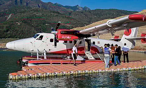 A 19-seater seaplane during its third trial landing at Tehri Lake in Koti Colony area after taking off from Dehradun's Jolly Grant Airport, in Tehri Garhwal district.