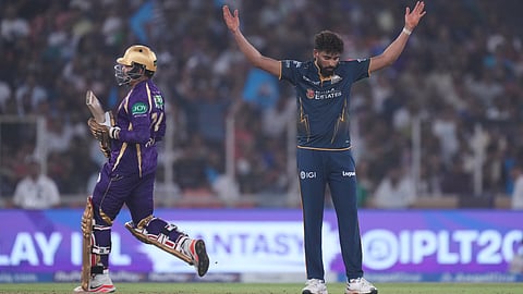 Gujarat Titans' Mohammed Siraj celebrates the wicket of Kolkata Knight Riders' Sunil Narine, left, during the Indian Premier League cricket match between Gujarat Titans and Kolkata Knight Riders in Ahmedabad, India, Friday, April 17, 2026.