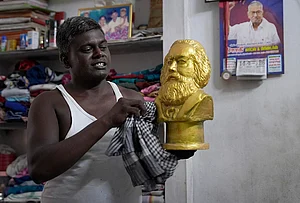 | Photo: Suresh Pandey/OUTLOOK : Meet Karl Marx. In this part of the world, he is not the philosopher or economist who altered the course of world history, but a Communist — a construction worker by profession. He lives with his family in a modest one-room house. In a State that prides itself on its Dravidian legacy, Marx, like many others in this village, nurtures a quiet hope: to build a just, classless society — the very ideal that Marxists have long envisioned. “My father was a Communist. He gave me this name, and I carry it with pride.” he says
