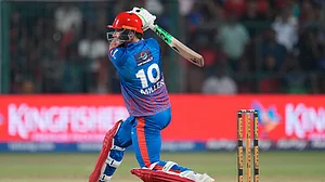 AP Photo/Aijaz Rahi : Delhi Capitals' David Miller plays a shot during the Indian Premier League cricket match between Royal Challengers Bengaluru and Delhi Capitals in Bengaluru, India, Saturday, April 18, 2026.
