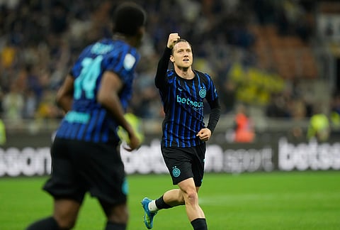 Inter Milan's Piotr Zielinski celebrates after scoring his side's 3rd goal during the Serie A soccer match between Inter Milan and Cagliari in Milan, Italy.