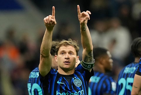 Inter Milan's Nicolo Barella celebrates after scoring his side's 2nd goal during the Serie A soccer match between Inter Milan and Cagliari in Milan, Italy.
