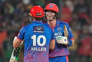 | Photo: AP/Aijaz Rahi : Delhi Capitals' Tristan Stubbs and David Miller celebrate their win in the Indian Premier League cricket match between Royal Challengers Bengaluru and Delhi Capitals in Bengaluru.