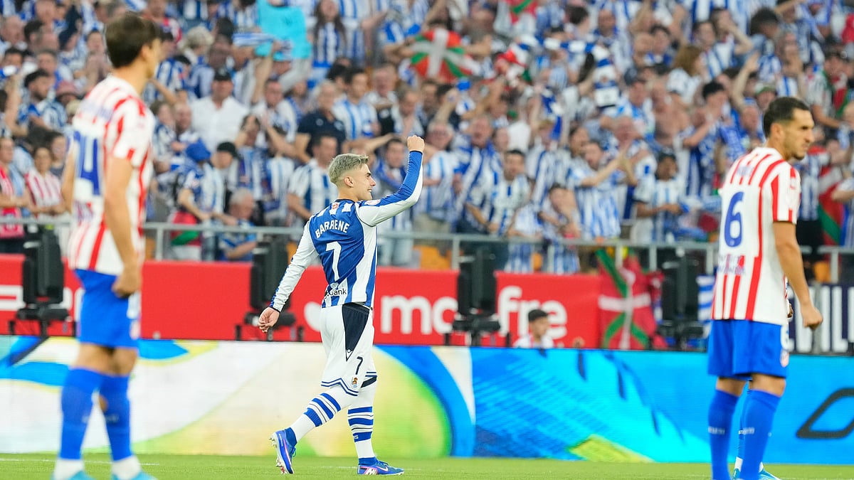 Real Sociedad's Ander Barrenetxea celebrates after scoring his side's first goal during the Copa del Rey final soccer match between Atletico Madrid and Real Sociedad in Seville, Spain, Saturday, April. 18, 2026. - (AP Photo/Jose Breton)