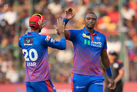 Delhi Capitals' Lungi Ngidi celebrates the dismissal of Royal Challengers Bengaluru's Jitesh Sharma during the Indian Premier League cricket match between Royal Challengers Bengaluru and Delhi Capitals in Bengaluru.