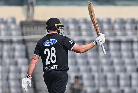 New Zealand's Dean Foxcroft celebrates his fifty runs during the first one day international cricket match between Bangladesh and New Zealand in Mirpur, Bangladesh.