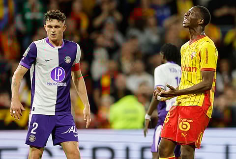 Lens' Rayan Fofana reacts during a League One soccer match between Lens and Toulouse in Lens, France.