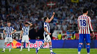 (AP Photo/Jose Breton) : Real Sociedad's Mikel Oyarzabal celebrates after scoring his side's second goal during the Copa del Rey final soccer match between Atletico Madrid and Real Sociedad in Seville, Spain, Saturday, April. 18, 2026.