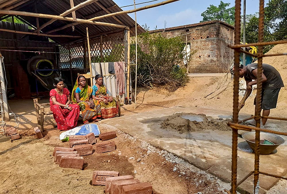 Lalgarh: Maoist violence victim Bidu Singh sits with family in Bandhgora village