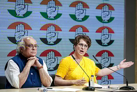 General Secretary of the All India Congress Committee (AICC) Priyanka Gandhi Vadra, right, and Jairam Ramesh address a press conference at the party's headquarters, in New Delhi.
