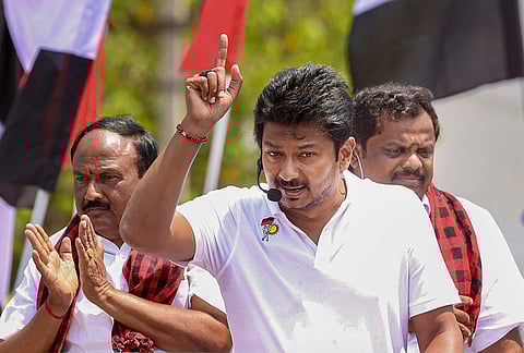 Tamil Nadu Deputy Chief Minister and DMK Youth Wing Secretary Udhayanidhi Stalin, centre, addresses an election campaign in support of party candidates for Gobichettipalayam and Anthiyur constituencies, N Nallasivam, left, and M Sivabalan, right, respectively, ahead of the state assembly elections, in Erode district. 