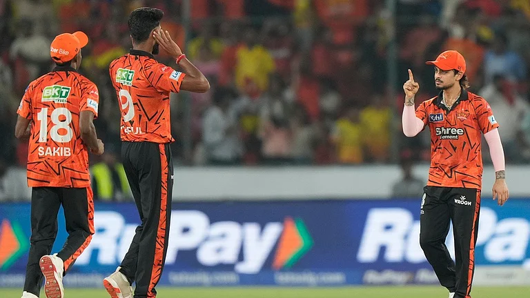 Sunrisers Hyderabad's captain Ishan Kishan, right, Praful Hinge, second left, and Sakib Hussain celebrate the wicket of Chennai Super Kings' Jamie Overton during the Indian Premier League cricket match between Sunrisers Hyderabad and Chennai Super Kings in Hyderabad, India, Saturday, April 18, 2026. - AP Photo/Mahesh Kumar A.