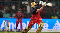 | Photo: AP/Aijaz Rahi : Royal Challengers Bengaluru's Tim David plays a shot during the Indian Premier League cricket match between Royal Challengers Bengaluru and Lucknow Super Giants in Bengaluru, India.