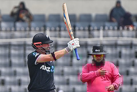 New Zealand's Henry Nicholls celebrates his fifty runs during the first one day international cricket match between Bangladesh and New Zealand in Mirpur, Bangladesh.