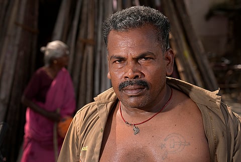 There are people like Muthukrishnan, an ardent CPI(M) worker who earns his living as an LPG delivery man. His commitment to the party is unmistakable — the hammer and sickle emblazoned across his chest.