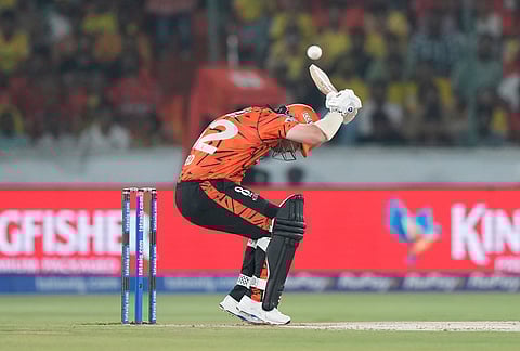 Sunrisers Hyderabad's Travis Head ducks a bouncer during the Indian Premier League cricket match between Sunrisers Hyderabad and Chennai Super Kings in Hyderabad.