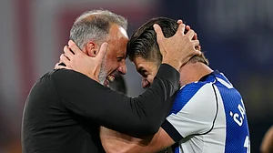 (AP Photo/Jose Breton) : Real Sociedad's head coach Pellegrino Matarazzo, right, celebrates with Duje Caleta-Car after winning the Copa del Rey final soccer match between Atletico Madrid and Real Sociedad in Seville, Spain, Saturday, April. 18, 2026.
