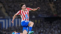 (AP Photo/Jose Breton) : Atletico Madrid's Julian Alvarez celebrates after scoring his side's second goal during the Copa del Rey final soccer match between Atletico Madrid and Real Sociedad in Seville, Spain, Saturday, April. 18, 2026.