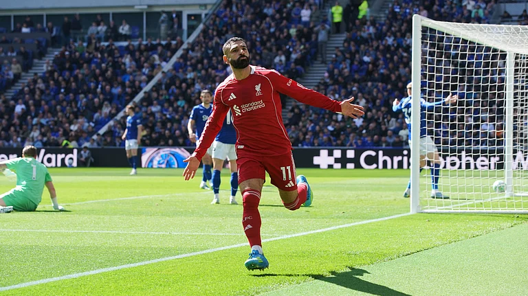 Liverpool's Mohamed Salah celebrates scoring his side's opening goal during the English Premier League soccer match between Everton and Liverpool in Liverpool, England, Sunday, April 19, 2026. - | Photo: AP/Ian Hodgson