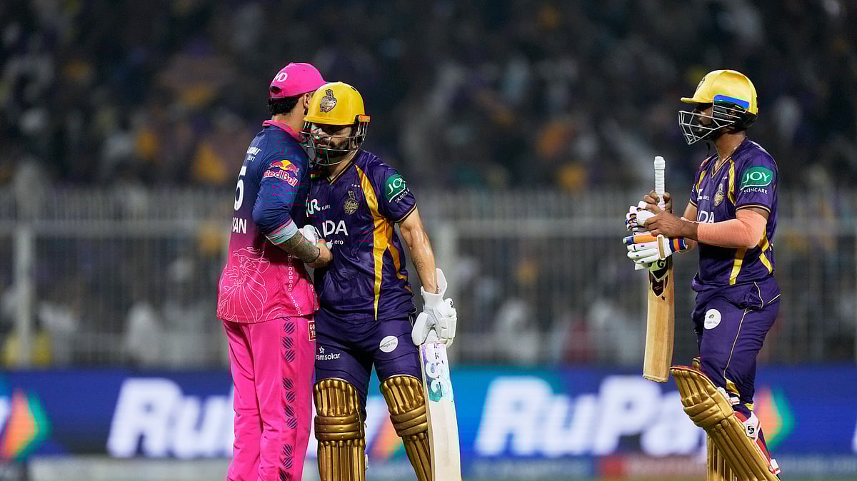 Rajasthan Royals' captain Riyan Parag, left, congratulates Kolkata Knight Riders' Rinku Singh after Kolkata Knight Riders won the Indian Premier League cricket match against Rajasthan Royals in Kolkata, India, Sunday, April 19, 2026. - (AP Photo/Bikas Das)