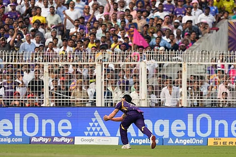 Kolkata Knight Riders' Ramandeep Singh takes the catch to dismiss Rajasthan Royals' Vaibhav Sooryavanshi during the Indian Premier League cricket match between Kolkata Knight Riders and Rajasthan Royals in Kolkata, India.