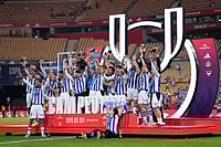 Atletico Madrid Vs Real Sociedad: La Real Win Fourth Copa Del Rey Title On Penalties In Seville | Photo: AP/Jose Breton : Real Sociedad's team players celebrate with the trophy after the Copa del Rey final soccer match between Atletico Madrid and Real Sociedad in Seville, Spain.