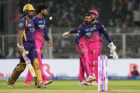 Rajasthan Royals' Ravindra Jadeja, second right, celebrates the wicket of Kolkata Knight Riders' Angkrish Raghuvanshi, left, during the Indian Premier League cricket match between Kolkata Knight Riders and Rajasthan Royals in Kolkata, India.