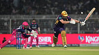 AP/Bikas Das : Rajasthan Royals' Dhruv Jurel, left, collects the ball before stumping Kolkata Knight Riders' Cameron Green, right, out during their Indian Premier League match in Kolkata.