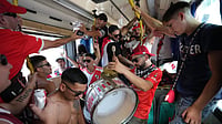 AP/Rodrigo Abd : River Plate fans ride a bus on their way to the stadium for an Argentine league match against Boca Juniors in Buenos Aires, Argentina.